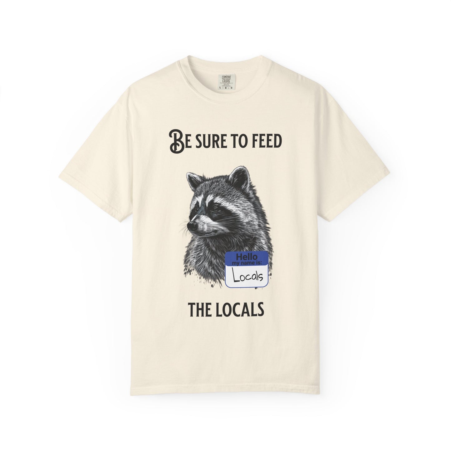 Be Sure to Feed the Locals T-Shirt — Raccoon Graphic Tee with "Hello, I'm Locals" Name Tag